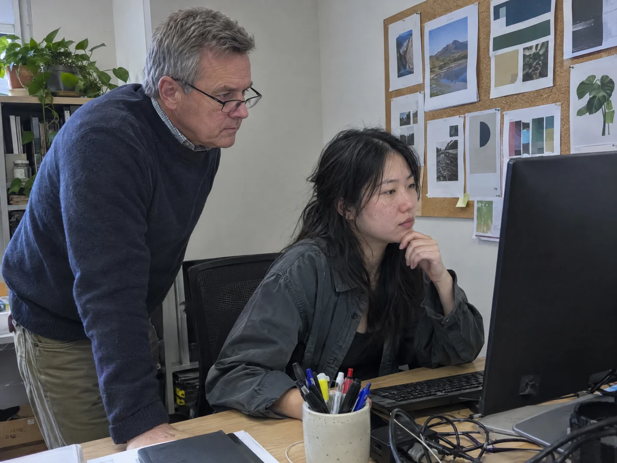 Hiring manager reviewing work with a contract designer