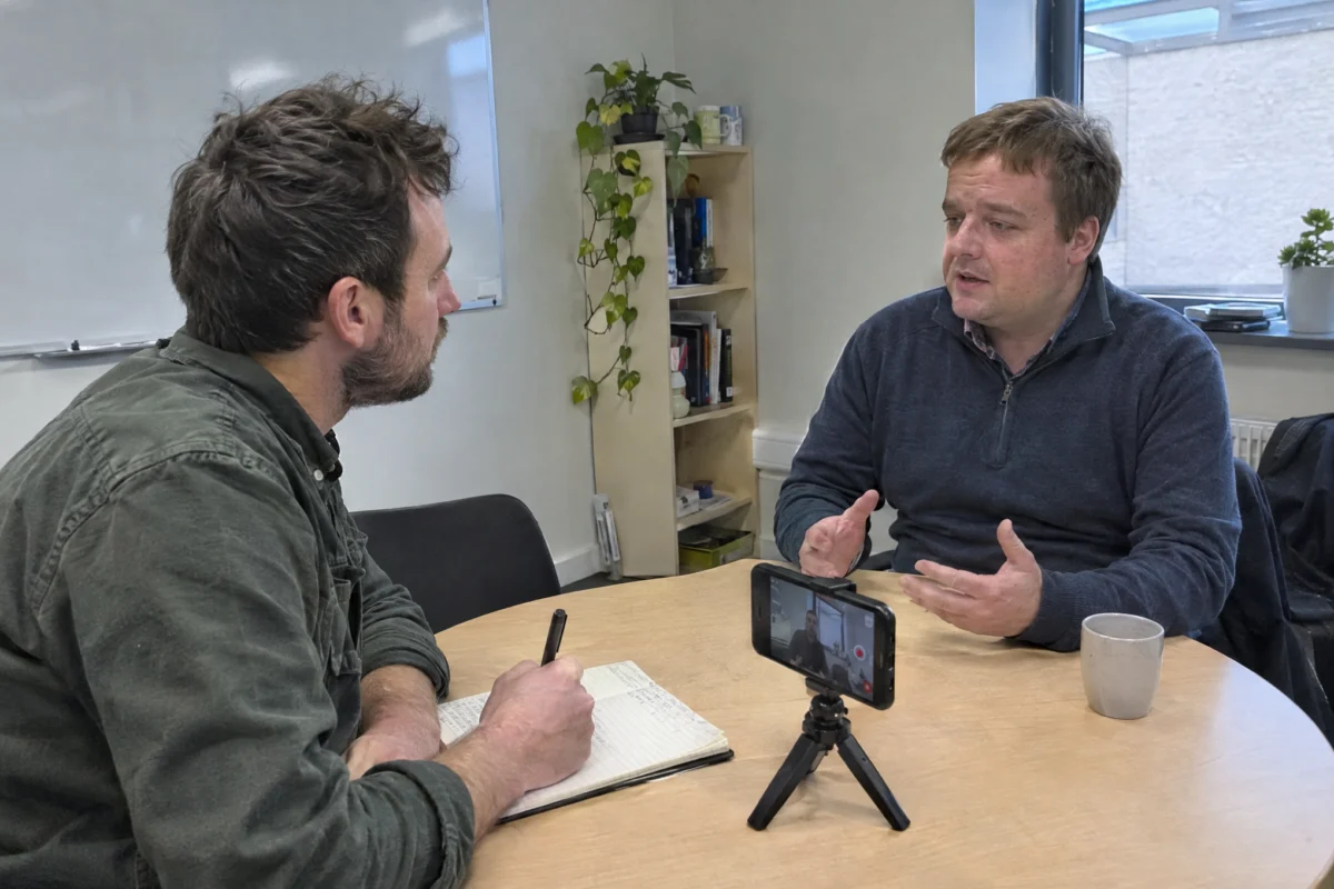 Content writer interviewing a colleague for a company article